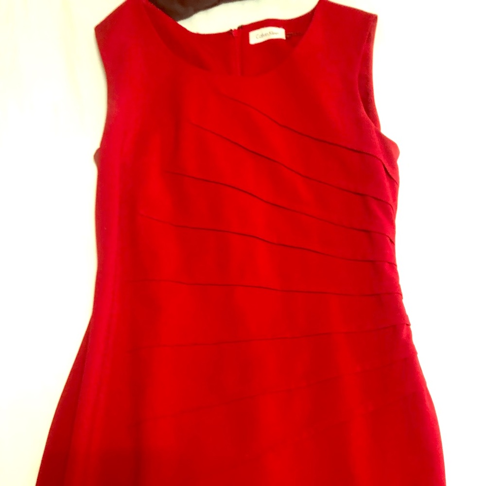 Red dress with side flattering ruching.